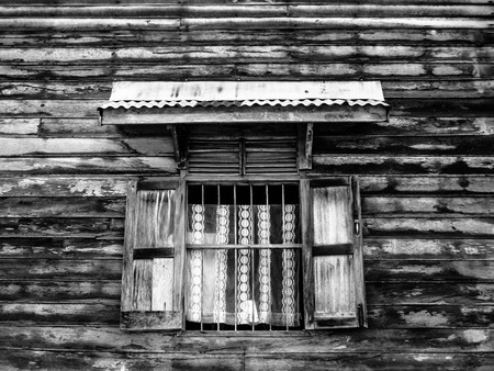 window in wood wall of cultureの写真素材