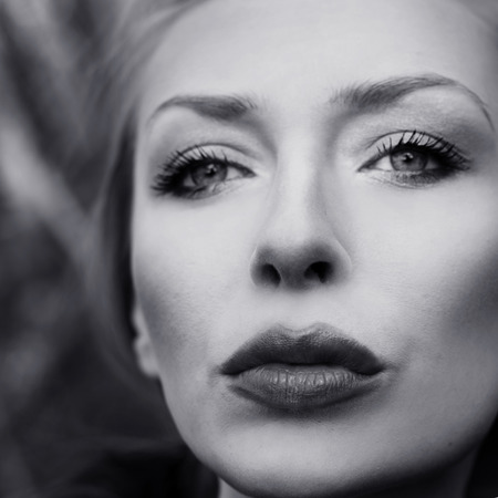 Closeup portrait of beautiful lady with amazing eyes.の写真素材