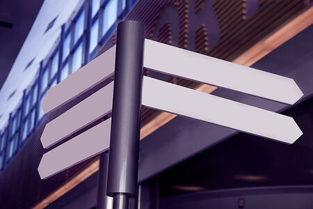 Conceptual photo of empty directional sign in shopping centre.の写真素材