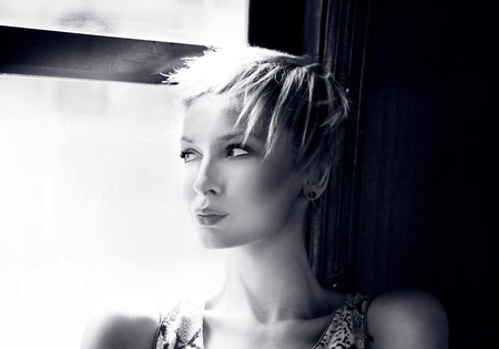 Portrait of beautiful sensual blonde woman looking away, traveling.の写真素材