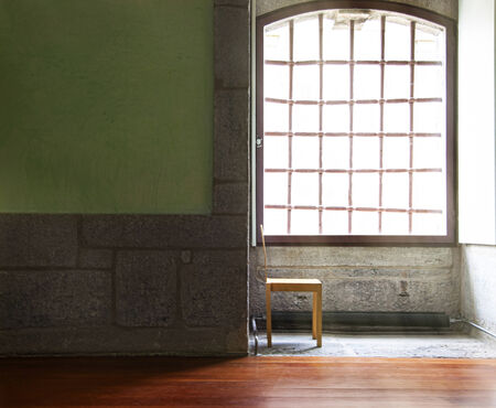 Conceptual photo of room with chair and window.の写真素材