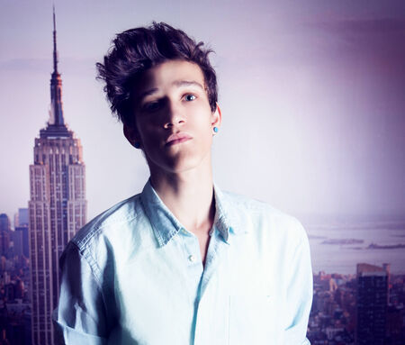 Portrait of young handsome teenage guy looking at camera. Fashionable man.の写真素材