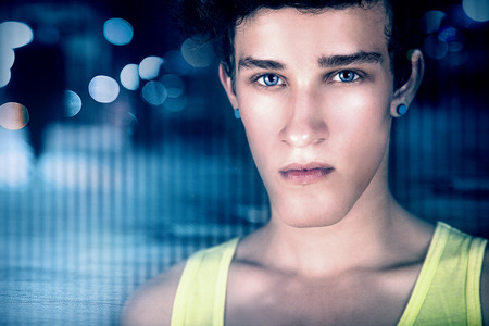 Portrait of young handsome teenage guy looking at camera. Fashionable man.の写真素材