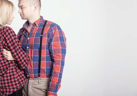 Beautiful blonde young woman posing with handsome man の写真素材