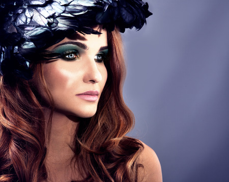 Beauty portrait of attractive redhead woman with perfect makeup. Profile photo.の写真素材