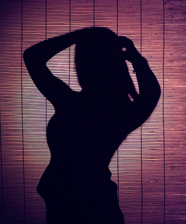 Shadow of sensual womanの写真素材