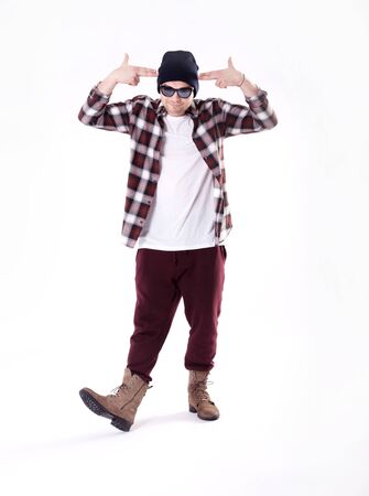 Handsome young man posing in fashionable clothes. Studio shot.の写真素材