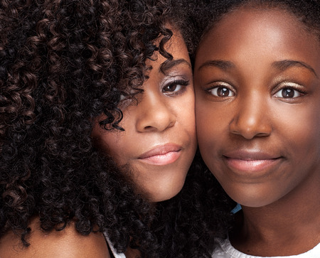 Closeup beauty portrait of young african american girls with glamour makeup.の写真素材