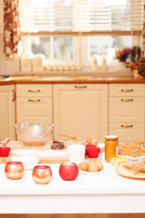 Gingerbread baking in bright kitchen. Christmas time.