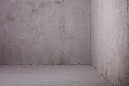 Photo of empty grey conrete room. Corner.の写真素材