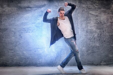 Young male modern dancer dancing.の写真素材