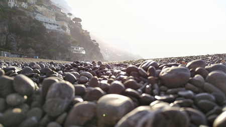 Landscape of beautiful morning at stone beach - Italy.の写真素材