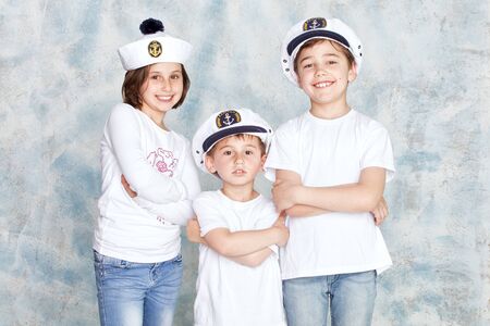 Group of smiling kids wearing marines hats.の写真素材