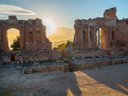 Landscape of the ancient theatre of Taormina. Greek theatre and Etna volcano, southern Italy.の写真素材