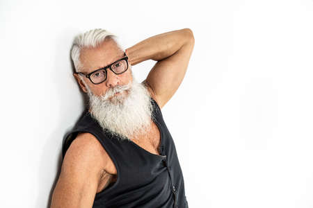 Portrait of bearded stylish mature man. Sexy senior men looking at camera. Studio photo.の写真素材