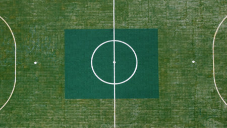 Aerial view with drone of floating green football field. Ko Panyi, Thailand, Asia. Copy space....
