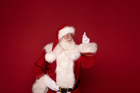 Christmas is coming! Real Santa Claus posing in studio.の写真素材