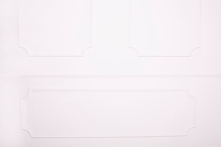 Decorative stucco on the classic background, white wall. Studio shot.の写真素材