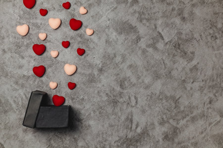 Valentine's day background with red hearts. Top view with copy spaceの写真素材