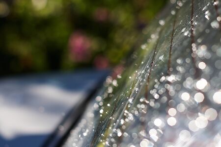 Water drop at car window  の写真素材