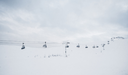 Cabins litfs at the mountains with cloudy weather