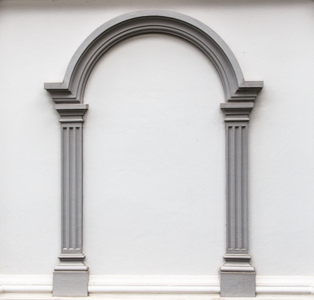 Arch molding decorates on the plain concrete wall の写真素材