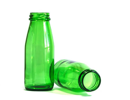 Green Bottles on White Background, with focus on Left bottleの写真素材