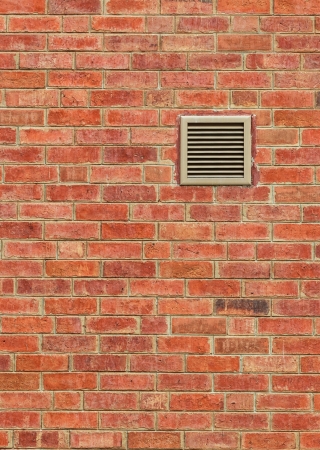 Vent on Old Brown Brick Wallの写真素材