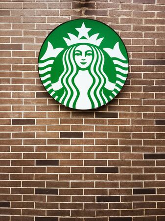 BANGKOK - JUNE 7: Starbucks sign is displayed at the facade of a Starbucks store, on June 7, 2016 in Bangkok, Thailand. Starbucks is the world's largest coffee house which has more than 22,000 stores in 66 countries.のeditorial素材