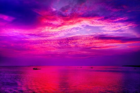 Spectacular Asian sunset over lake in Cambodiaの写真素材