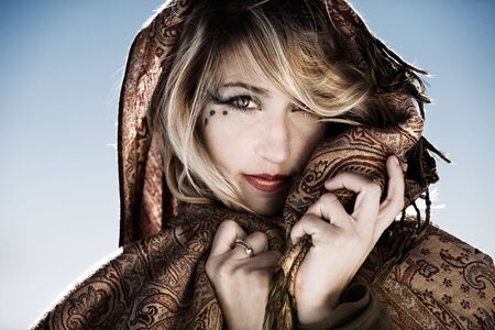 Stunning blonde model portrait with face veil