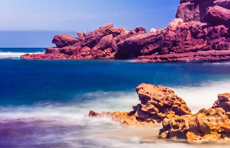 Landscape with a rocky beach at the Atlantic Oceanの写真素材