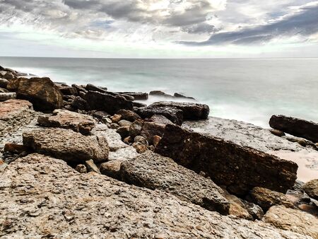 Seascape between sky and ocean in Ericeiraの写真素材