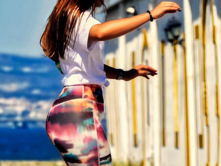 Young woman in tights balancingの写真素材