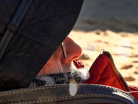 Profile of woman with black hat with nose detailの写真素材