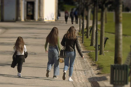 A sunny winter day walking in the parkの写真素材