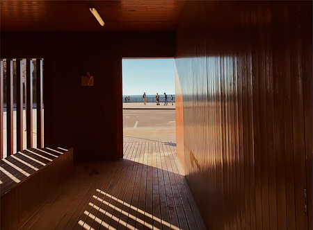 Perspective inside a passage with lights and shadows