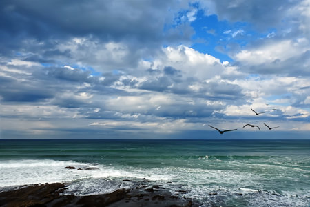 Seascape with dramatic clouds at the Atlantic ocean
