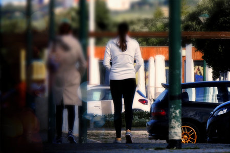 Passersby through the city in the morningの写真素材