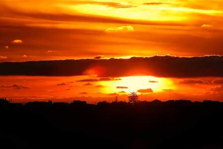 Rural landscape at sunset with defined cloudsの写真素材