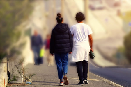 Young couple on a morning walkの写真素材