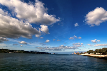 View from a river at the entrance to the ocean with a dramatic skyの写真素材