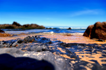 Seascape from a rocky beach at the beginning of summer