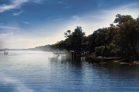 View from a river in Africa with the hazy horizonの写真素材