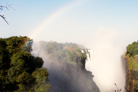 African landscape in broad daylight with a waterfallの写真素材