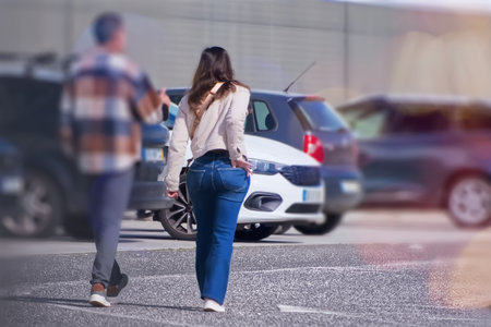 Young couple on the road. Shallow depth of fieldの写真素材