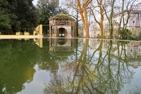 Reflection of a building in the water of a lake