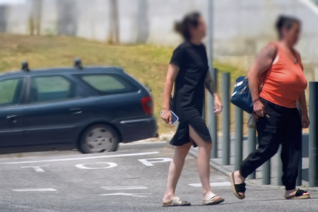 Couple walking on the street in the city. Motion blur.