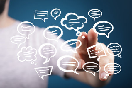 Person Interacting with Floating Speech Bubbles: Communication Concept