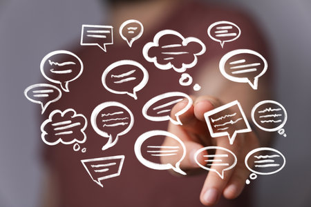 Man Interacting with Floating Chat Bubbles: Communication Conceptの写真素材